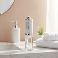 Smart Electric Water Flosser on marble countertop